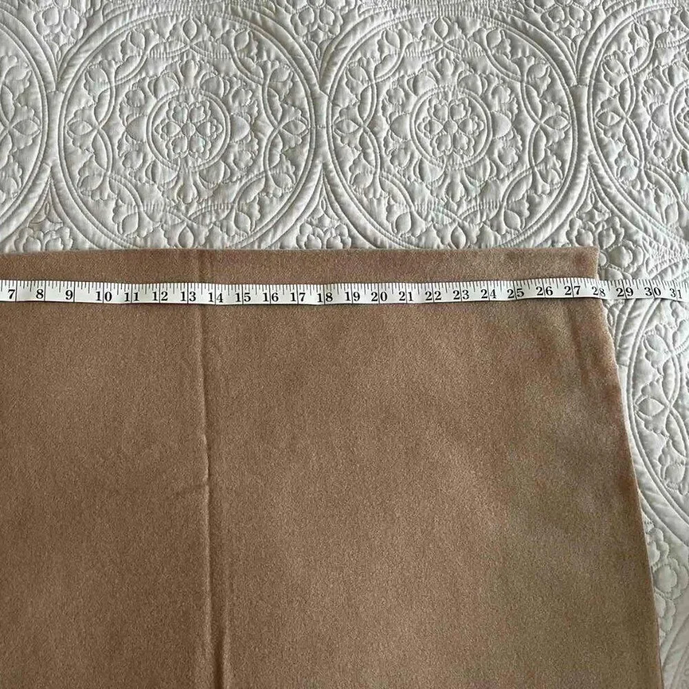 Brown Soft warm scarf is a mixture of polyester and viscose condition is new